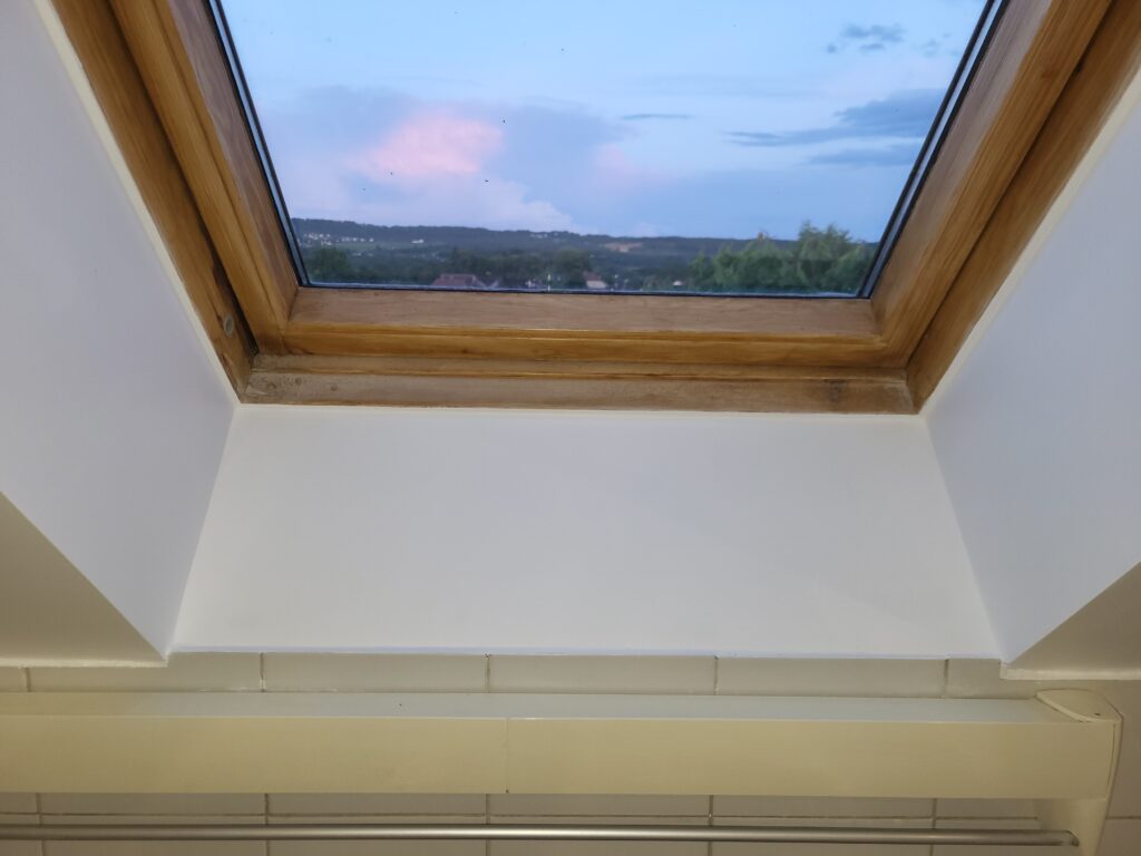 Rénovation enduit et peinture contour de fenêtre