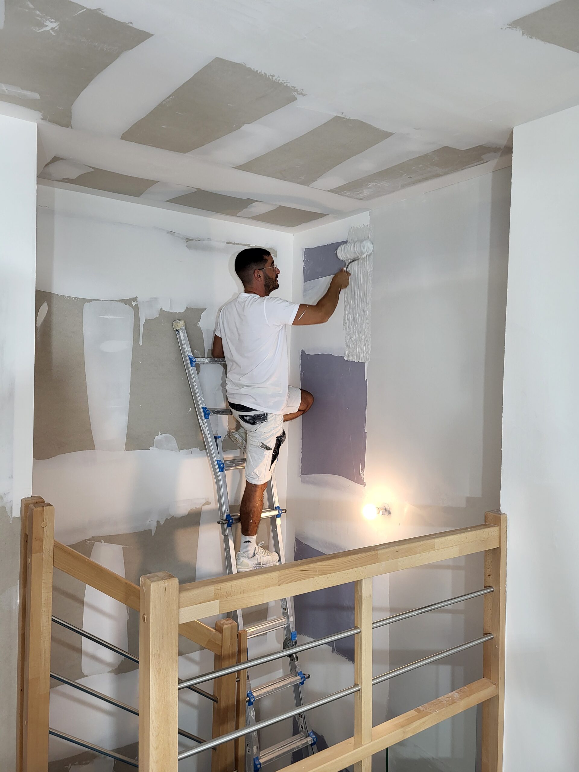 Équipe Peinture Reno en intervention plâtrerie